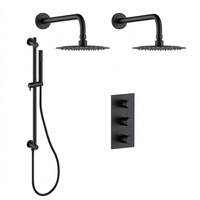 Matte black shower kit with 2 rain showerheads and 1 hand shower on a rail