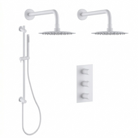Matte white shower kit with 2 rain showerheads and 1 hand shower on a rail